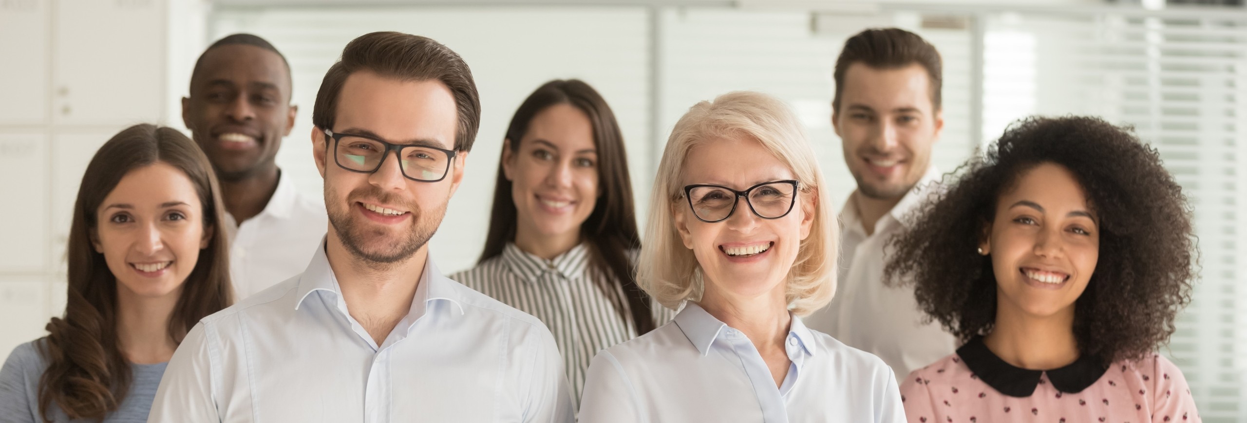 smiling professional business leaders and employees group team p